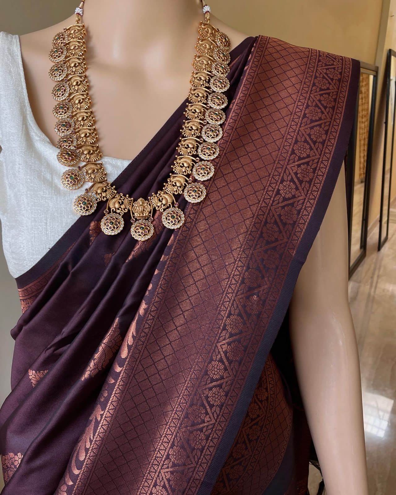 Women Kanjeevaram Saree with Floral Woven Motifs & Contrast Border